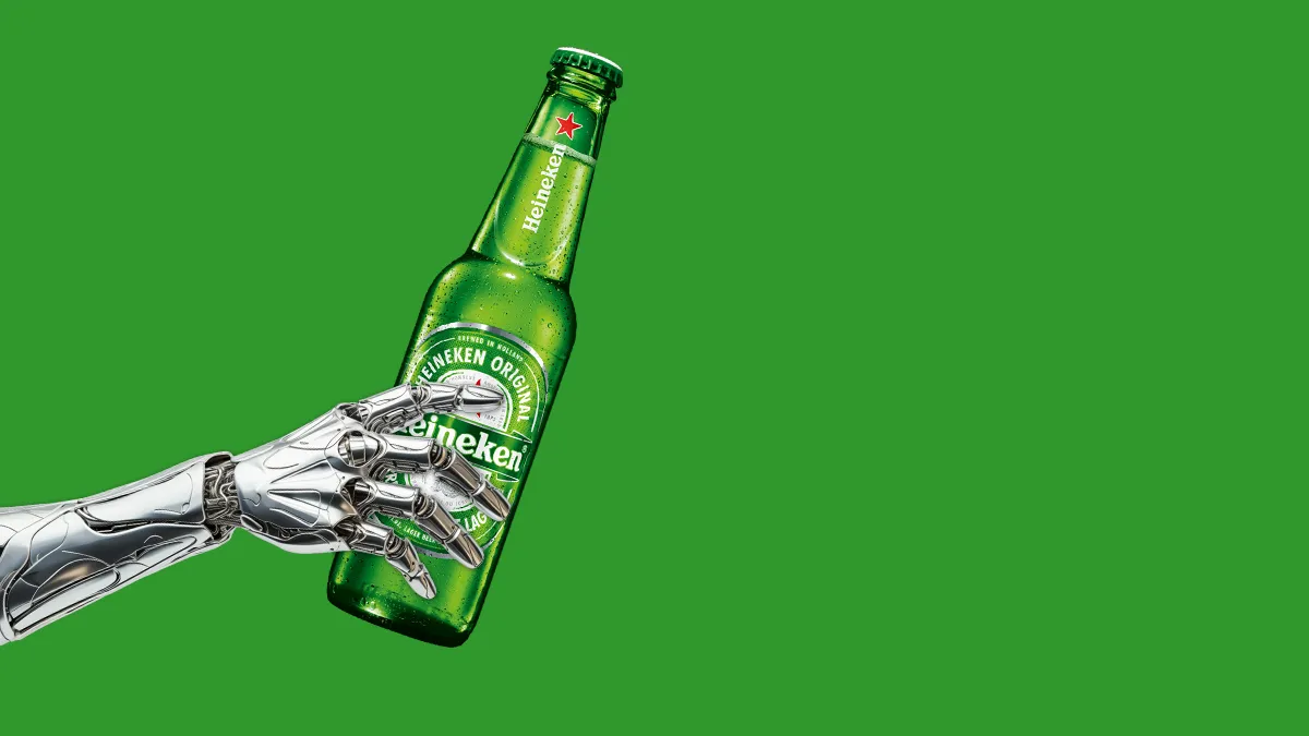 Picture of a Robot Holding Heineken Bottle