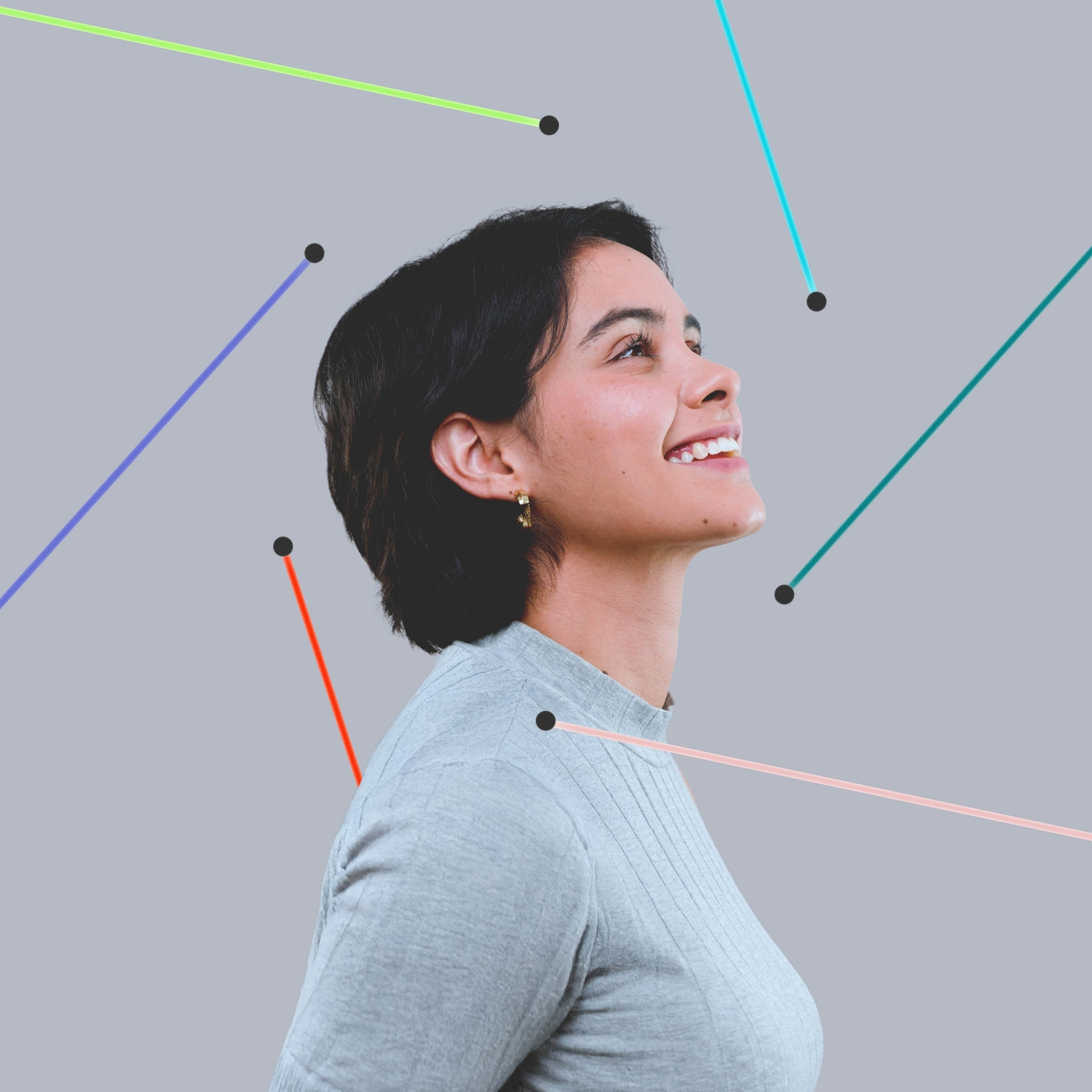A woman smiling and looking upward, surrounded by colourful lines on a dark background.